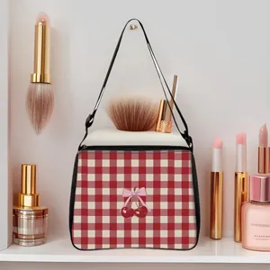 Pink checkered tote bag with cherry bow print and black handles for women