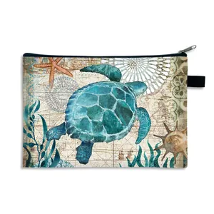 Flat canvas makeup bag with vintage nautical map and sea turtle prints and black zipper