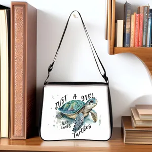 White tote bag with watercolor turtle print and Just a Girl Who Loves Turtles text