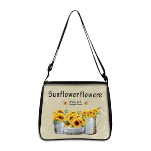 Sunflower and bee print tote bag with adjustable black straps and secure zipper closure