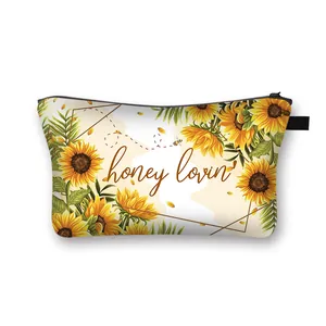 Floral sunflower makeup bag with zipper closure and honey lovin printed design