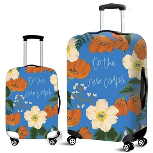 Floral luggage cover with To the New Couple print on elastic blue fabric for travel
