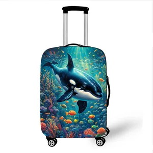 Elastic luggage cover featuring a dynamic orca and coral reef ocean scene print