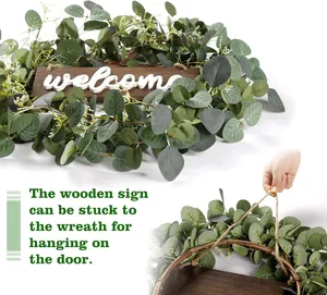 Detalle de corona de eucalipto con cartel de madera welcome y follaje verde realista