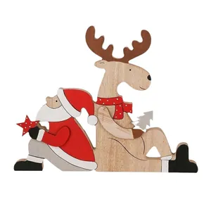 Handcrafted wooden Christmas ornaments featuring Santa Claus and reindeer tabletop decorations