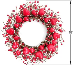 Detail of 18-inch Valentine's Day wreath with red heart berries on brown twig base