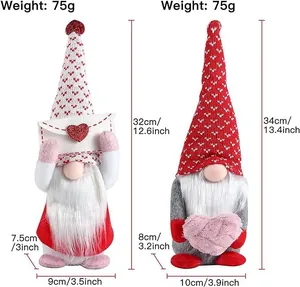 Detailed view of two Valentine Gnomes with hearts and envelope decorations
