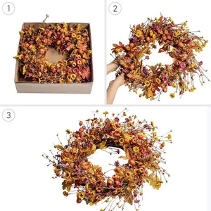 Autumn harvest wreath with berries and maple leaves for Thanksgiving door decor