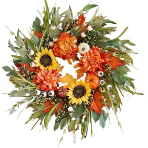 Couronne d'automne avec tournesols citrouilles et dahlias pour décor rustique