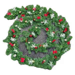 5m lush Christmas garland with red bows, snowflakes and gold ornaments for home decor