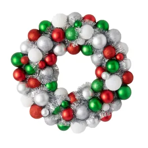Christmas wreath with red, green, silver, and white baubles in matte and glitter finish