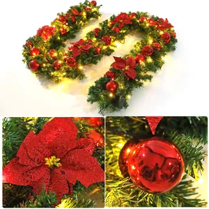 Deluxe 2.7m Christmas garland with pine needles, red poinsettia flowers and LED lights