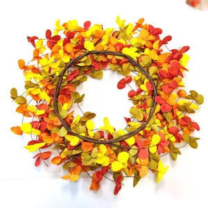 Orange money leaf and pumpkin berry wreath for autumn harvest and Thanksgiving door decor