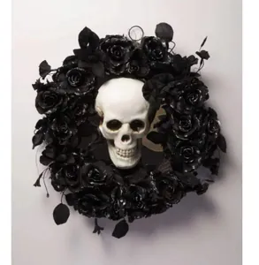 Close-up of Halloween wreath with realistic white skull and black artificial roses