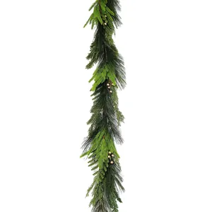Artificial Christmas garland with mixed green pine needles and golden berries on white background
