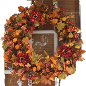 50cm autumn wreath with red sunflowers, maple leaves, and berries on a white window frame