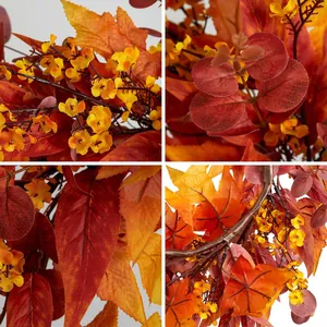 Autumn wreath with maple leaves and berries for Thanksgiving front door decor