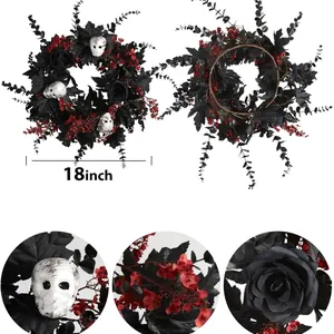 18-inch Halloween wreath with black maple leaves, red berries, and white skulls on vine base