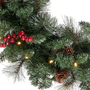 Christmas pine cone wreath with red berries, cedar needles, and warm LED lights