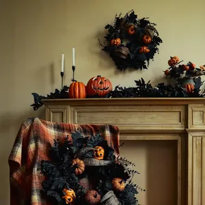 Halloween wreath with black maple leaves and orange pumpkins for farmhouse decor