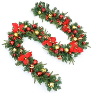 2.7m thick green Christmas garland with red poinsettias, berries, and gold festive balls