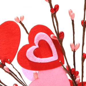 Artificial heart berry branches with red felt hearts and glossy beads for festival decor