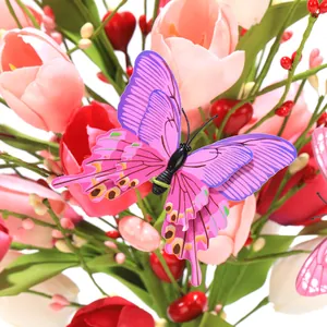 Artificial tulip bouquet with pink flowers and realistic purple butterfly garden decor