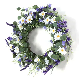 Macro detail of artificial daisy wreath with lavender and eucalyptus leaves