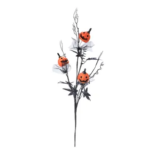 Halloween fall decorative branch with grinning pumpkins and black maple leaves ornament