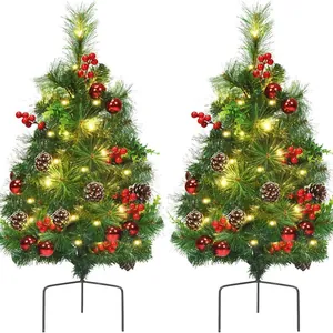 Set of two mini Christmas trees with LED lights, pine cones, red berries and ground stakes