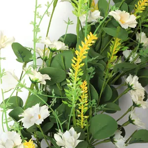 Close-up of white daisies and eucalyptus leaves with realistic texture on white background