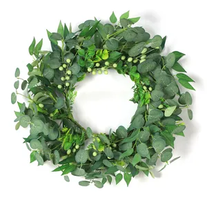 Artificial eucalyptus and berry wreath for home decor with lush green leaves and white berries
