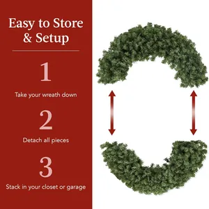 48 inch lighted Christmas wreath with green pine needles and a large red decorative bow