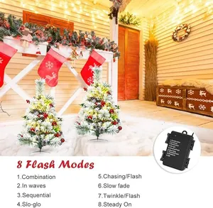Detail showing 8 lighting modes of mini Christmas trees with faux snow and red berries