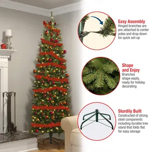 Detail of slim green pencil Christmas tree showing pre-lit lights and sturdy metal stand