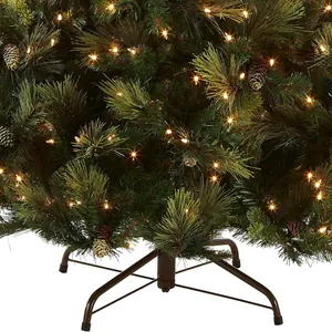 2.1m green PVC Christmas tree with warm white LED lights and pine cones on metal stand