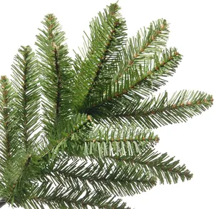 Close-up of dense PVC green pine needles and branch detail for a Christmas tree