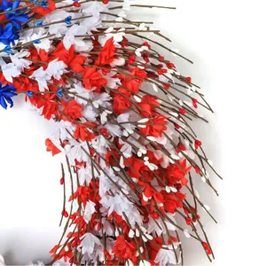 Patriotic wreath with red white and blue silk flowers and berries for home decoration