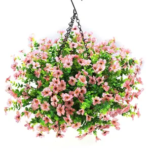Detail of pink striped faux flowers and green leaves in a black metal hanging basket