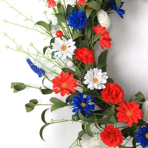 Patriotic July 4th wreath with red, white and blue flowers for Independence Day front door decor