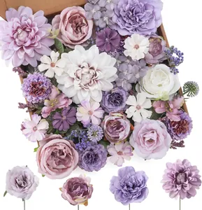 Detail of a purple artificial flower box set with roses, dahlias and silk peonies