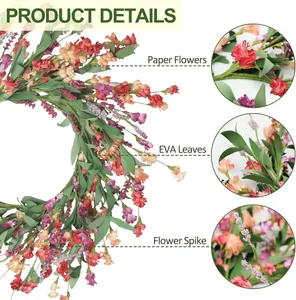Detail of artificial daisy wreath featuring paper flowers, EVA leaves and purple flower spikes