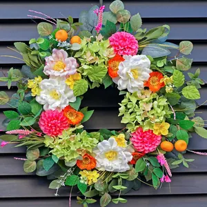 Colorful artificial wildflower wreath with peonies and eucalyptus leaves for front door decor