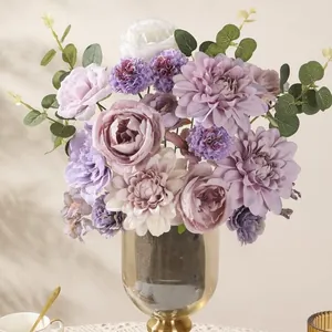 Purple and pink silk flower bouquet in a gold glass vase for wedding home decor