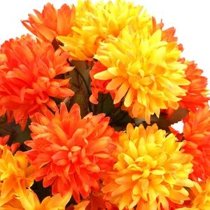 Artificial vibrant orange and yellow gradient daisies for garden and home decor