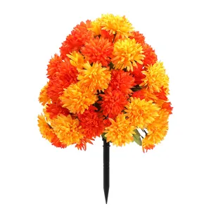 Vibrant gradient orange artificial marigold flower bush with integrated black ground stake