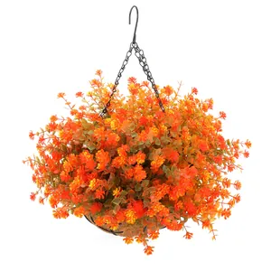 Hanging basket with autumn orange faux eucalyptus and coconut liner for outdoor decor
