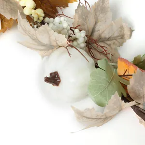 Autumn farmhouse decor featuring white pumpkin, berries and maple leaves on white background