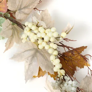 Autumn farmhouse garland with cream berries and fall maple leaves decoration on white backdrop