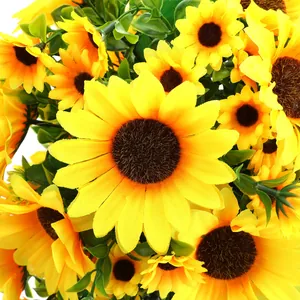 Artificial sunflower bouquet with vibrant yellow petals and realistic green leaves